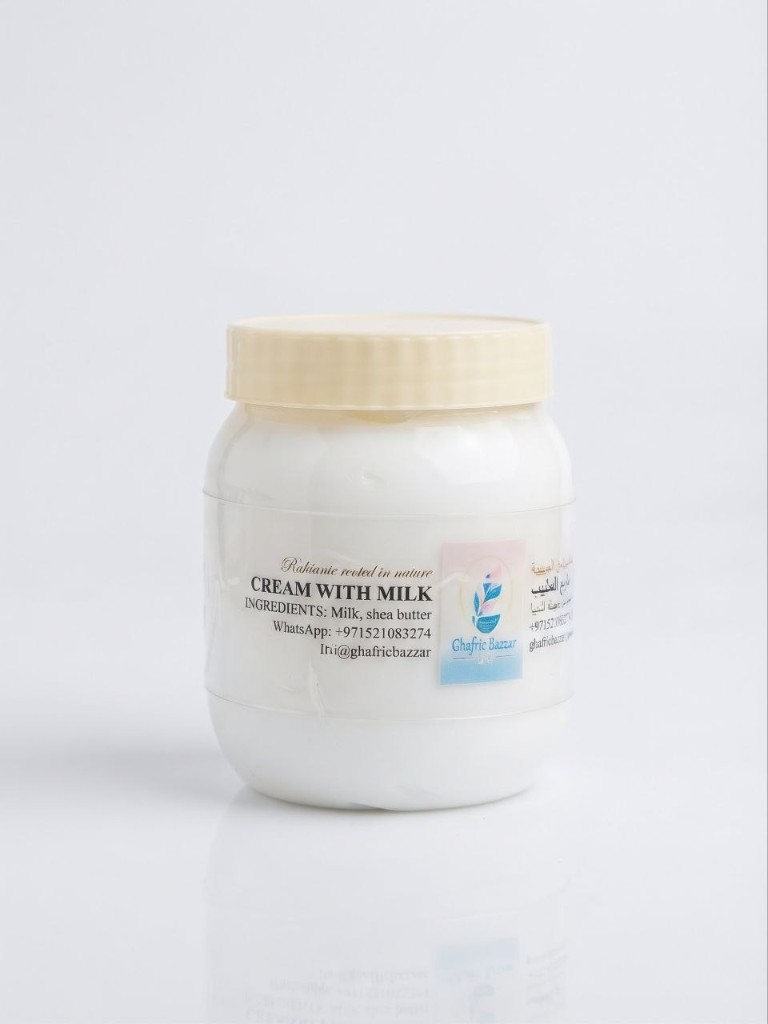 Cream with milk in a white jar