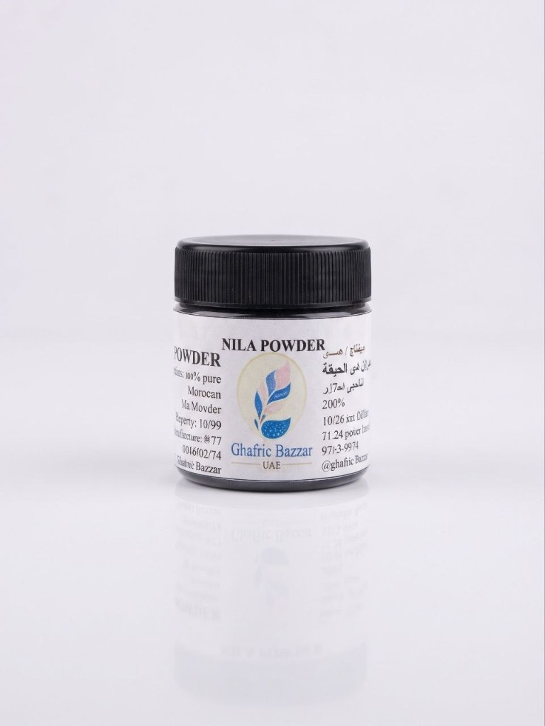 Nila powder in a small black-lid jar